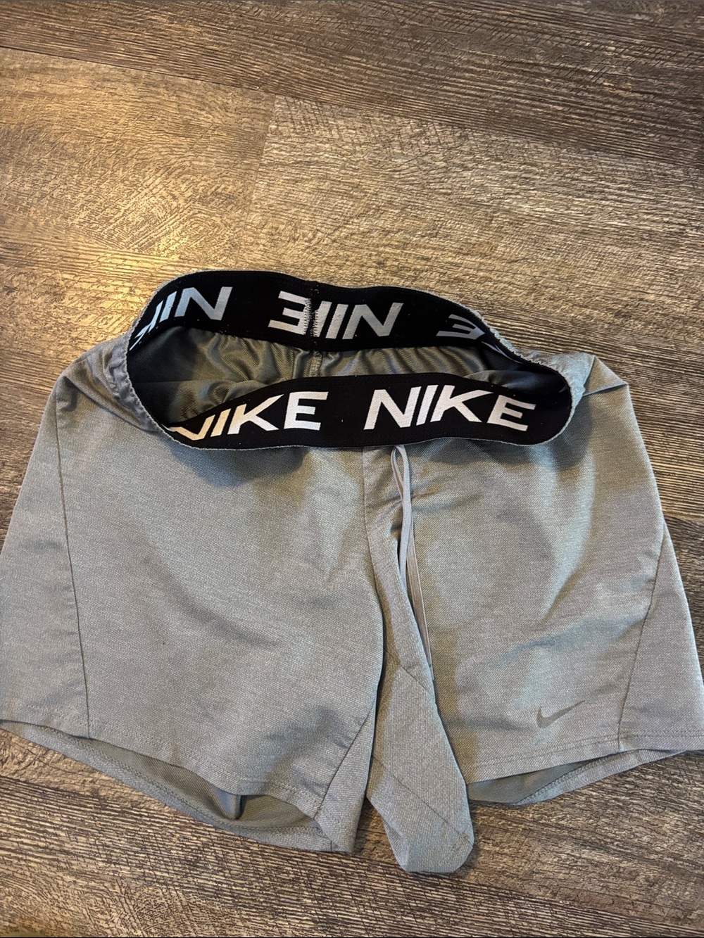 Nike Women's Light Gray Athletic Shorts with Black Branded Waistband